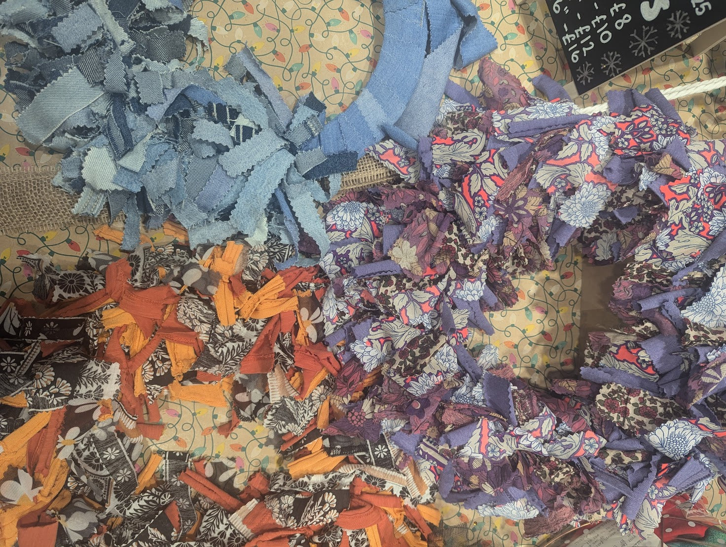 Collection of colorful fabric scraps in various patterns and colors.